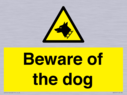 beware-of-the-dog-with-dog-warning-symbol~
